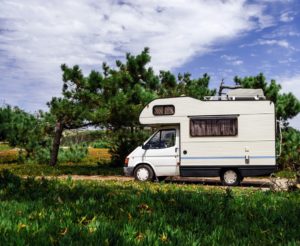 Touristic caravan staying in a forest