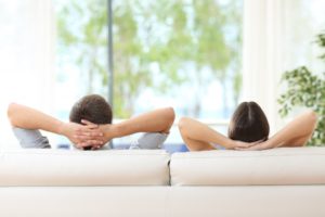 couple relaxing on the sofa