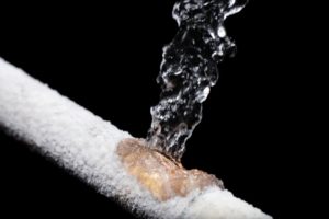 A pipe leaking with Freeze damage