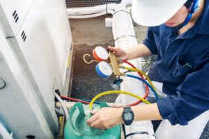 man checking the heating system
