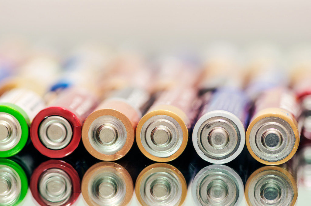 Closeup of pile of used alkaline batteries.