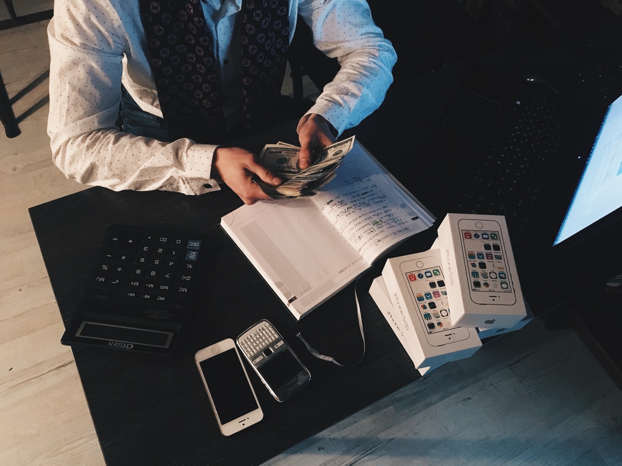 businessman computing finances