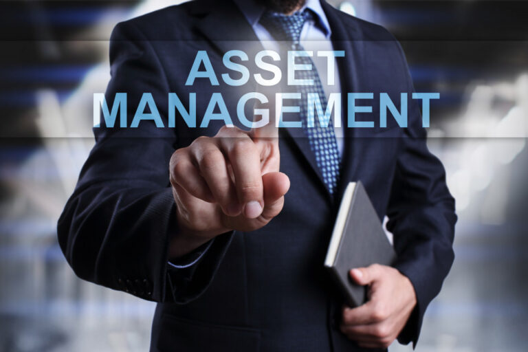 man pointing to asset management sign