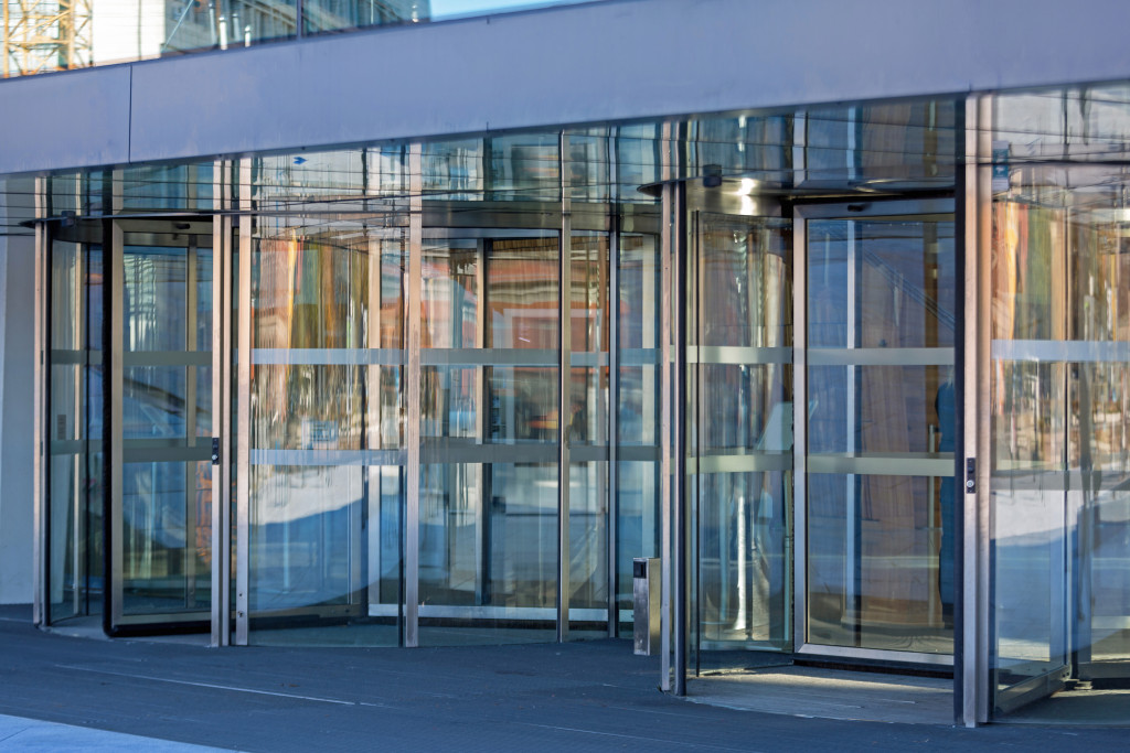 An image of automatic revolving doors at a building